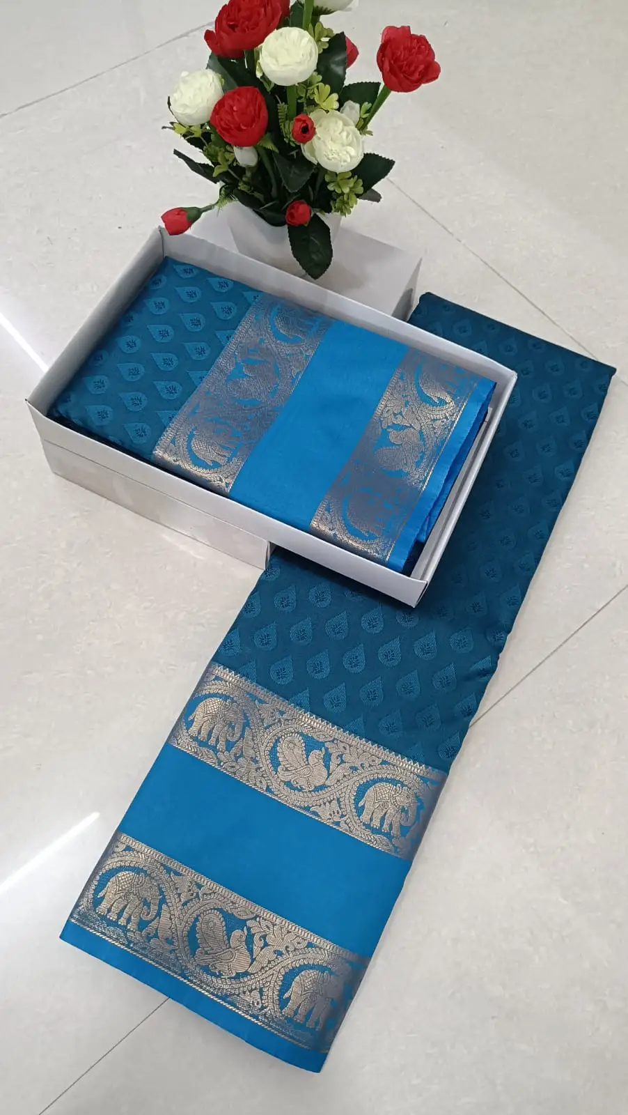 Elephant and Peacock Jacquard Border Soft Silk Saree